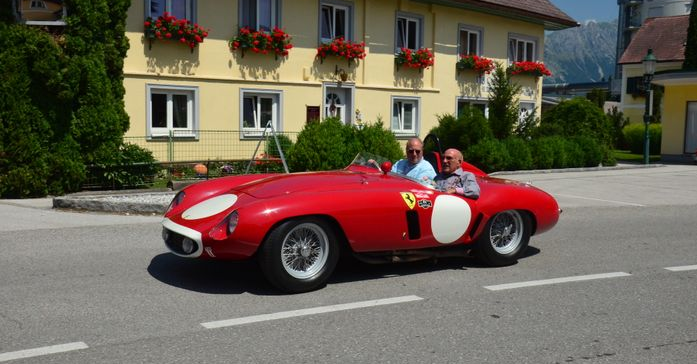 Stirling Moss in a Ferrari.