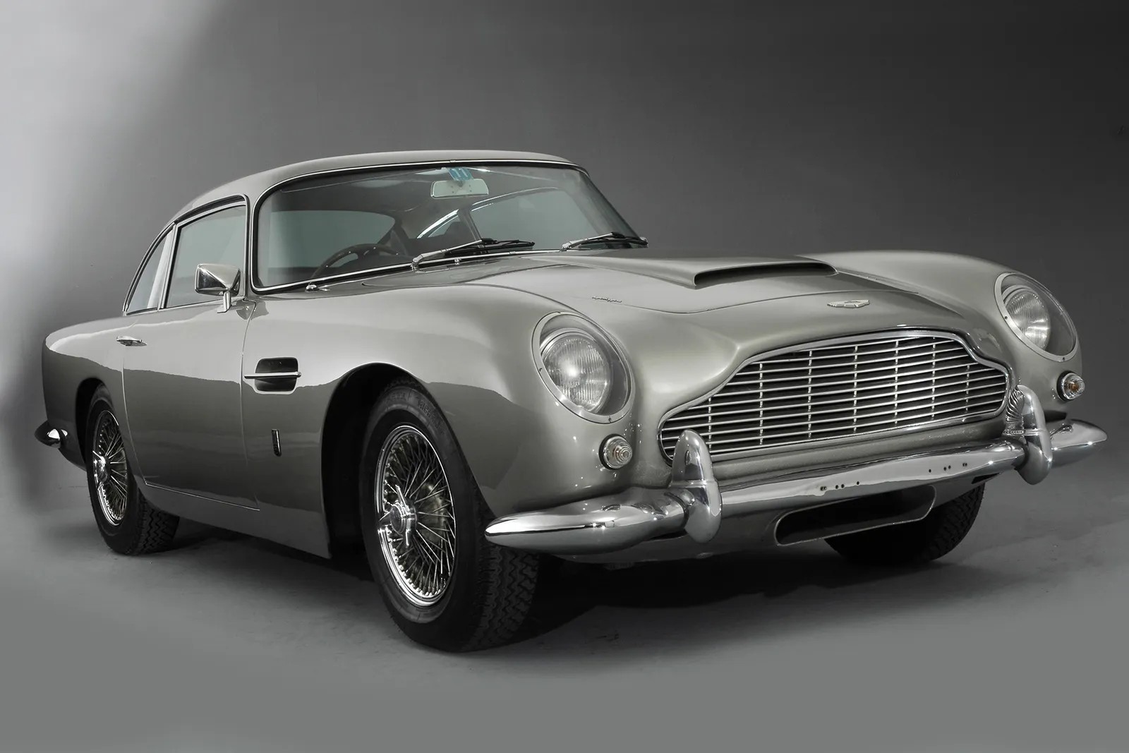 In 1965, Harrison bought his first ever extravagant car – a white Aston Martin DB5. Paul McCartney, also something of a petrol head (though nothing in comparison to his band mate), bought a DB6 that same year. 