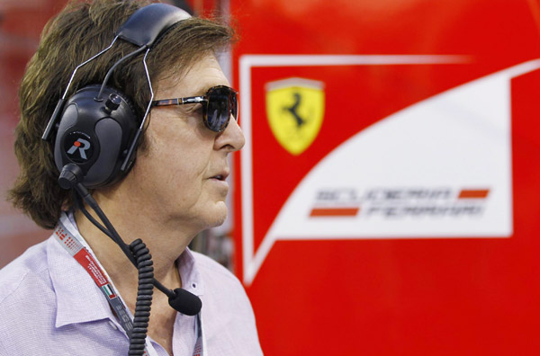 Paul McCartney watches from the pit during the qualifying session for the Abu Dhabi F1 Grand Prix at Yas Marina circuit on 12 November 2011. 