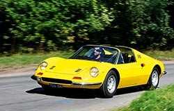A yellow Ferrari Dino.