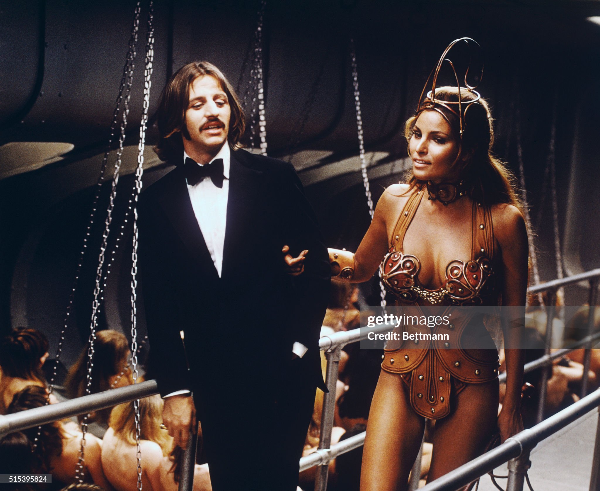 Beautiful Raquel Welch is a special guest as a slave priestess in charge of a bevy of topless girl rowers aboard a luxury liner in Commonwealth United's The magic Christian. in 1970.