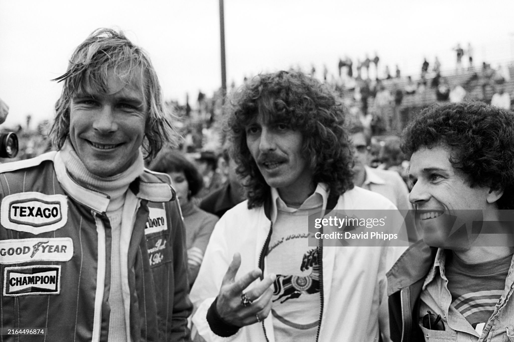 James Hunt with George Harrison at the United States Grand Prix West in Long Beach on 03 April 1977. 