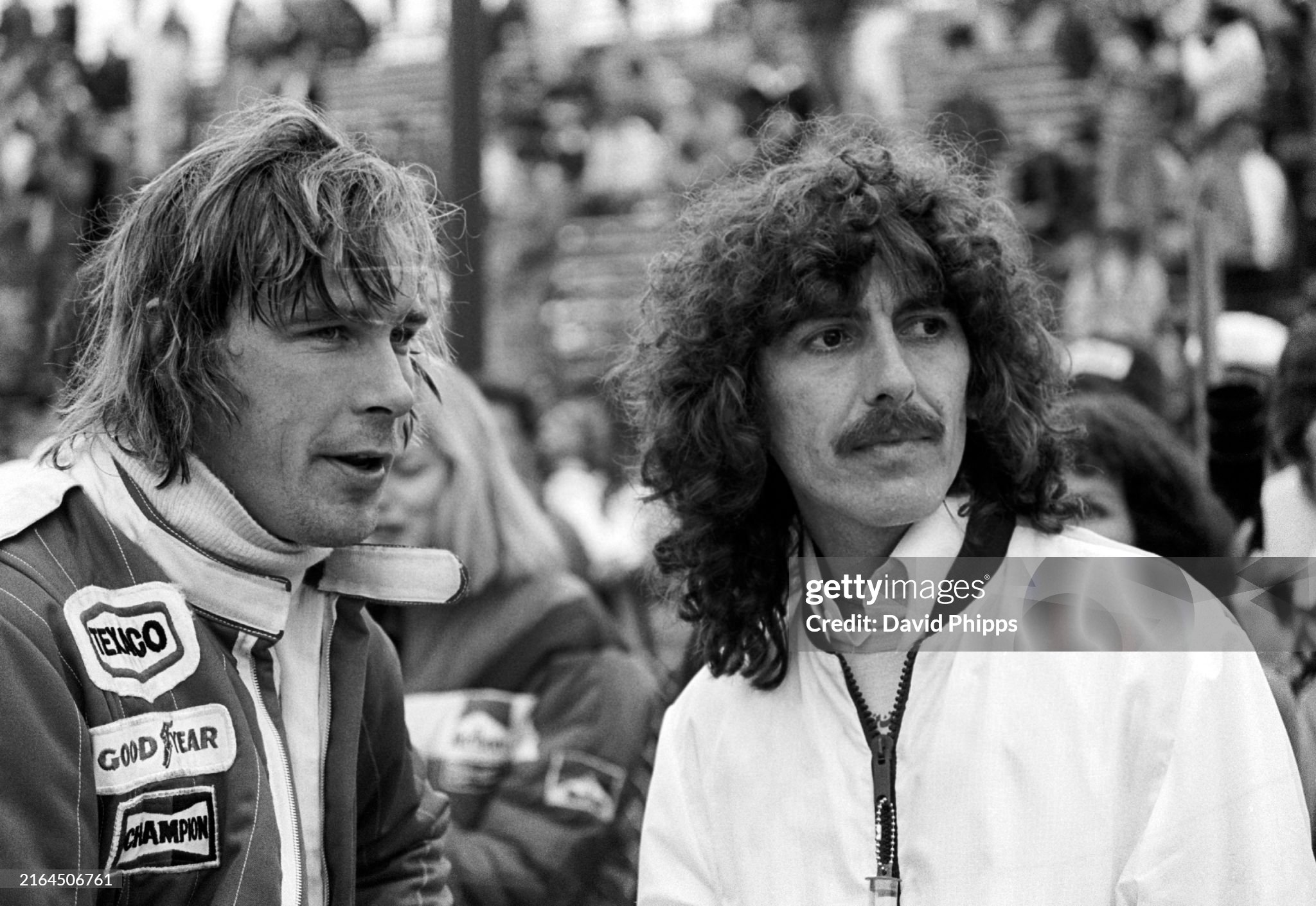 James Hunt with George Harrison at the United States Grand Prix West in Long Beach on 03 April 1977. 