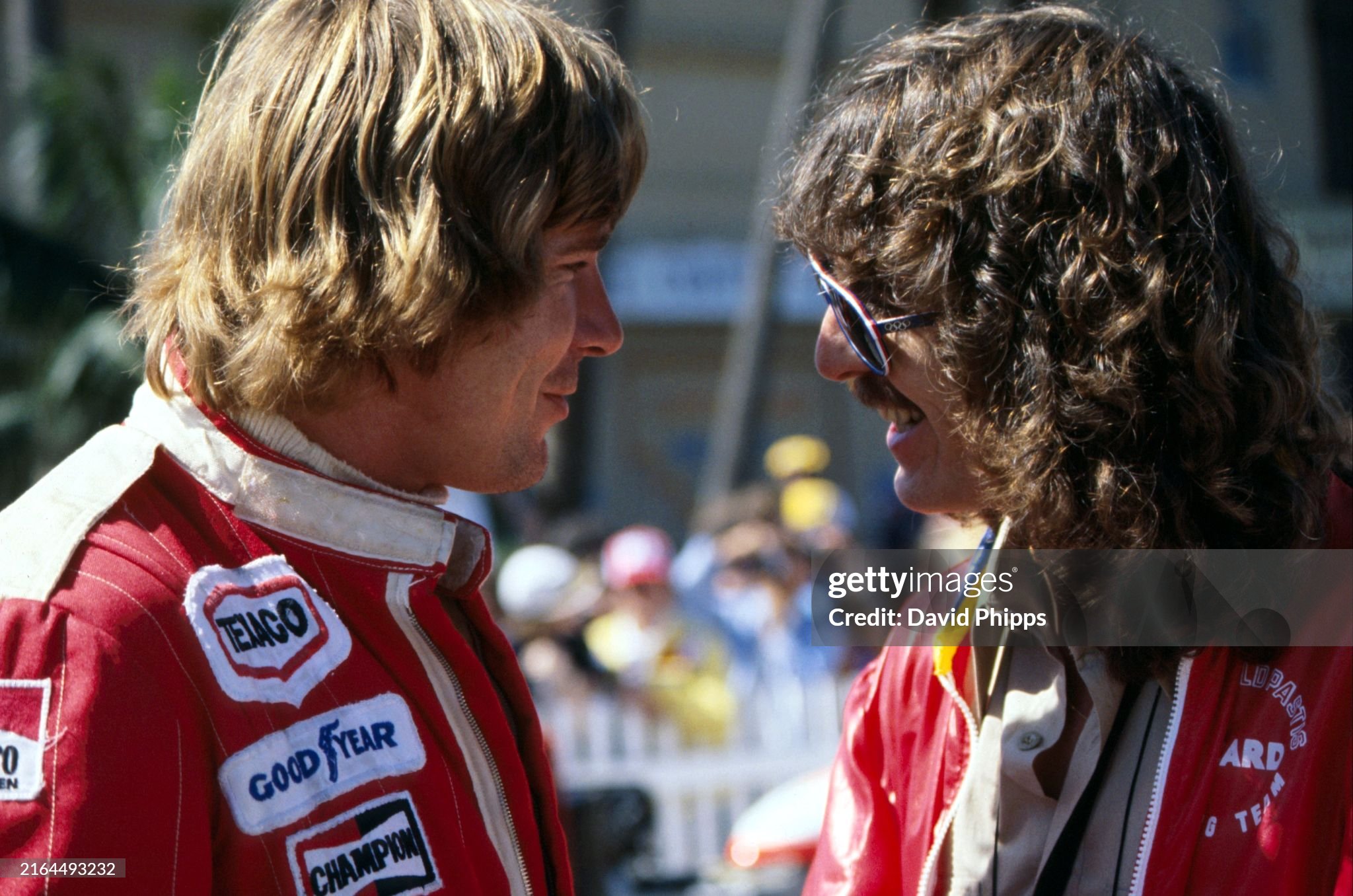 James Hunt, McLaren, talks with Beatles legend George Harrison at the United States Grand Prix West in Long Beach on 02 April 1978. 