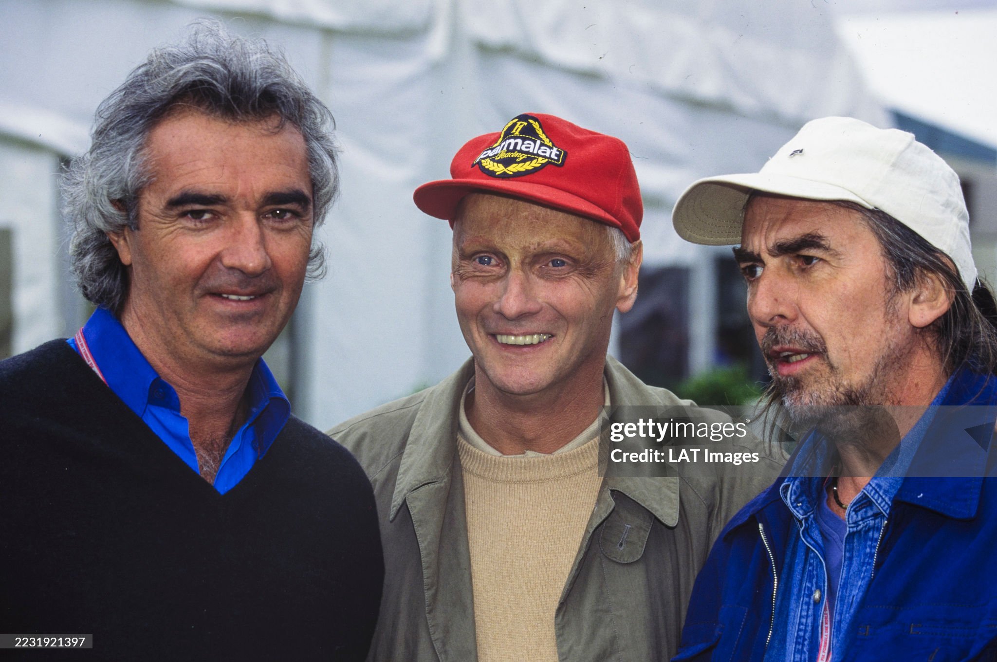 Flavio Briatore with Niki Lauda and George Harrison during the Australian Grand Prix at Adelaide Street Circuit on 12 November 1995. 
