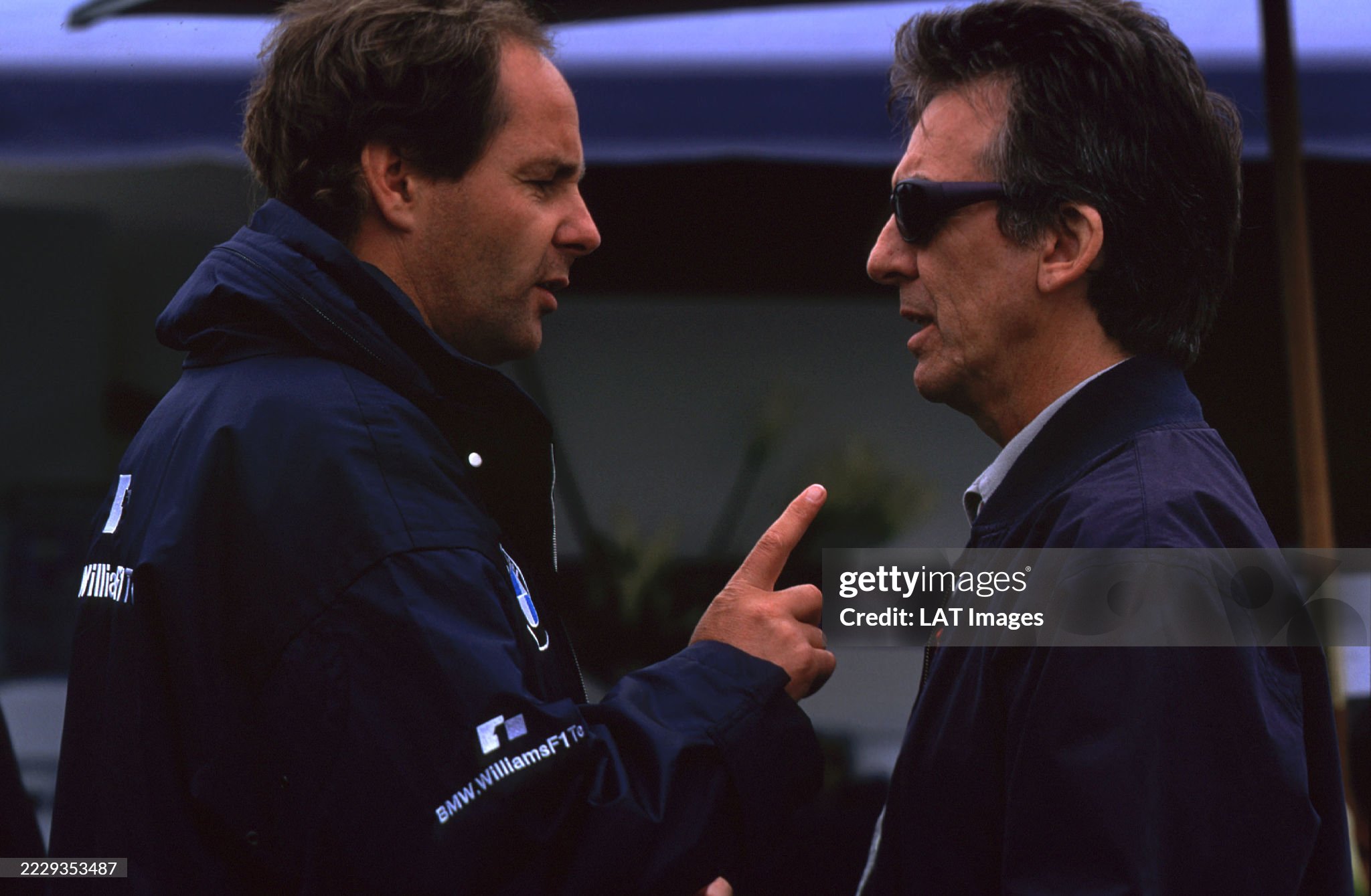 George Harrison with BMW Motorsport Director Gerhard Berger at the Canadian Grand Prix in Montreal, Quebec, 16 - 18 June 2000. 