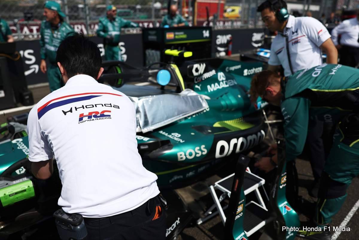 Honda engineers at work on the Aston Martin F1 car.