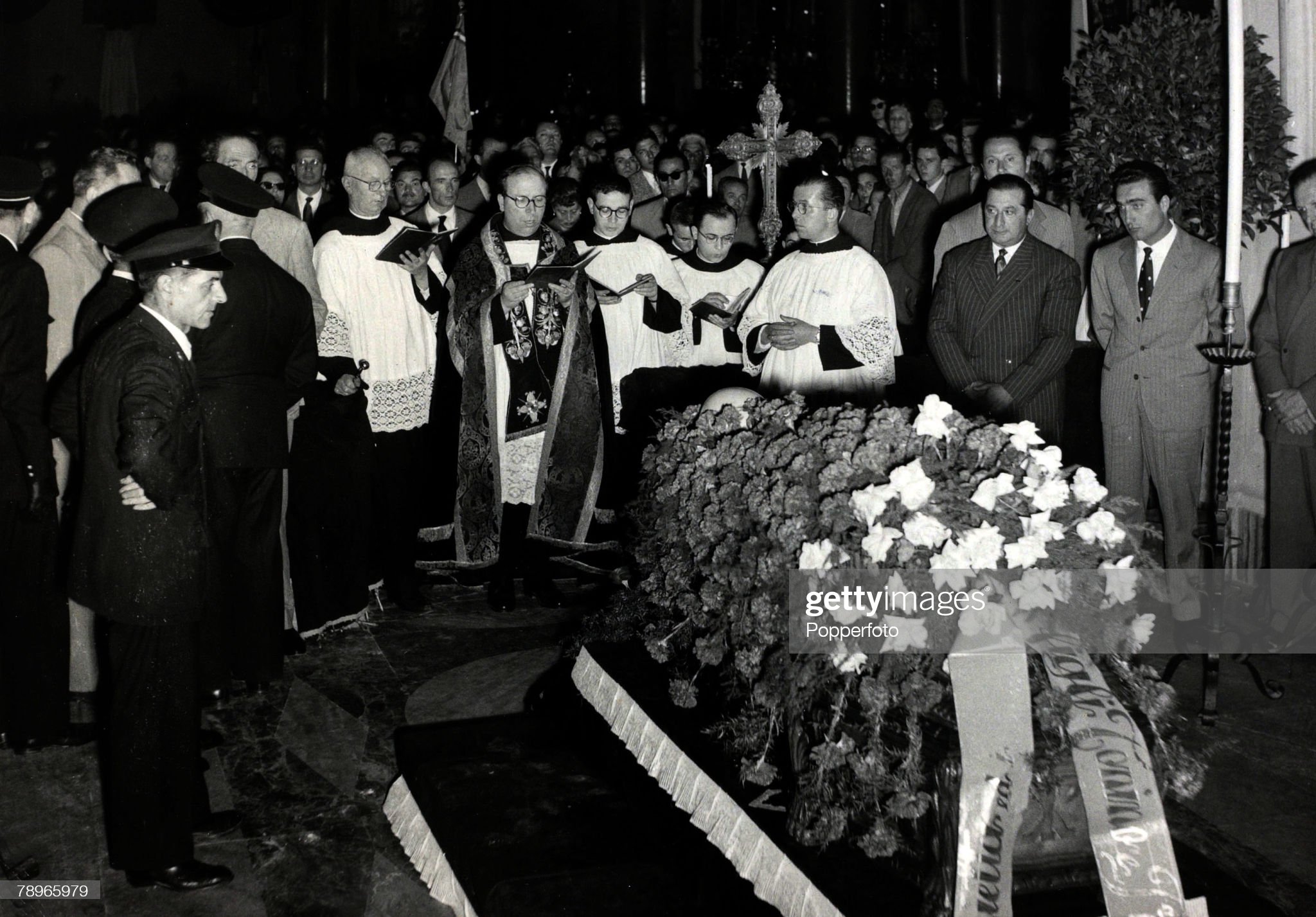 27th May 1955, the coffin of Alberto Ascari in Milan. 