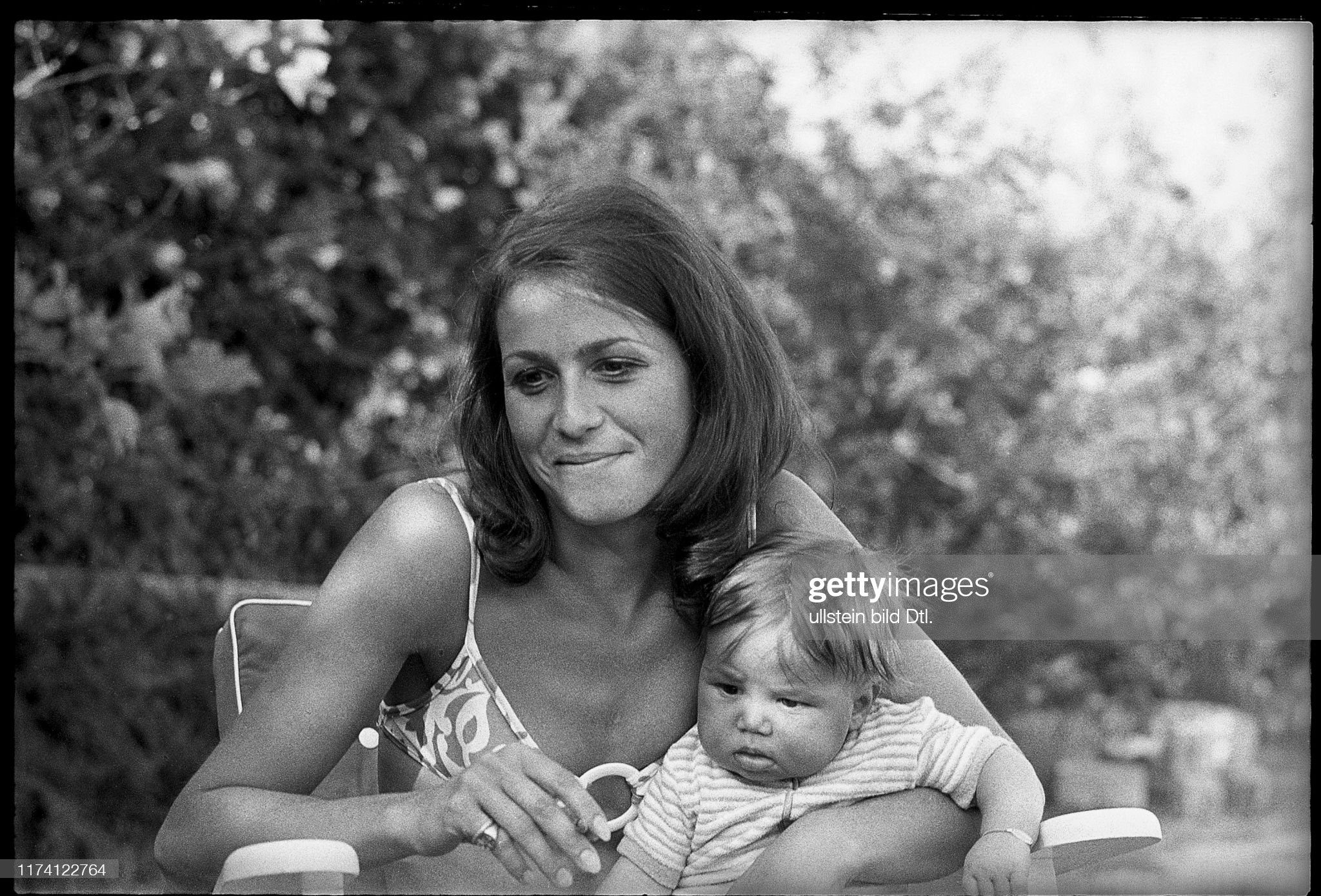 Simone, widow of Jo Siffert, with her son Philippe on July 01, 1973. 