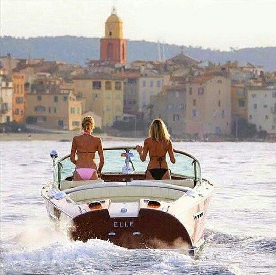 Girls in a motorboat at Saint-Tropez.