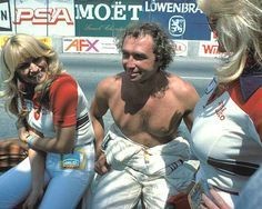 Jochen Mass with two girls.