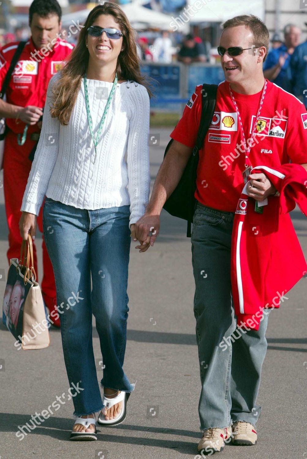 Rubens Barrichello with a girl at the Australian Grand Prix in Melbourne. 