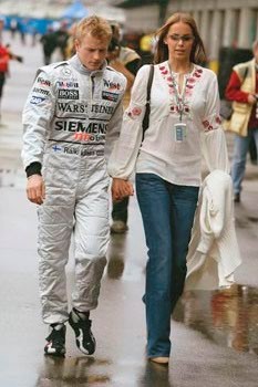 Kimi Raikkonen with his girlfriend.