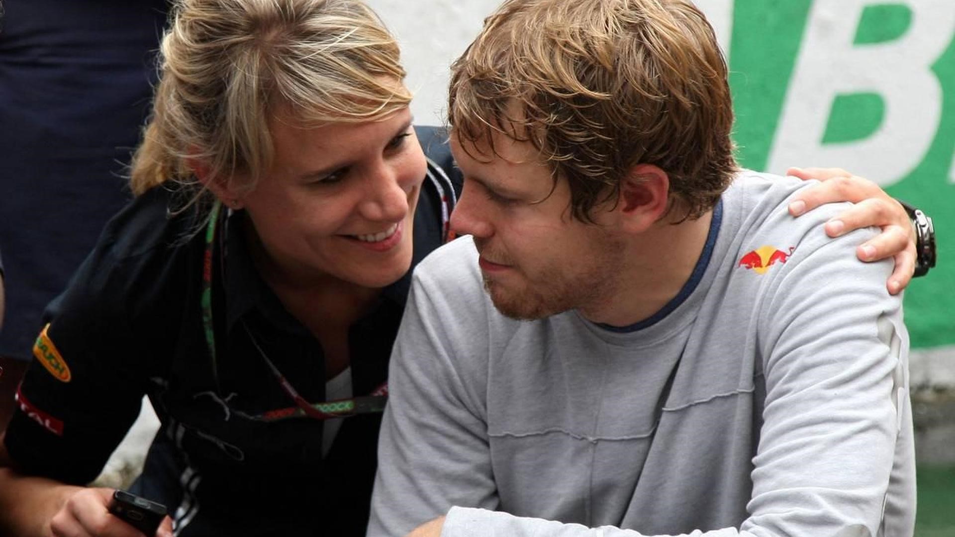 Sebastian Vettel and his press officer at Red Bull racing Britta Roeske in 2010.