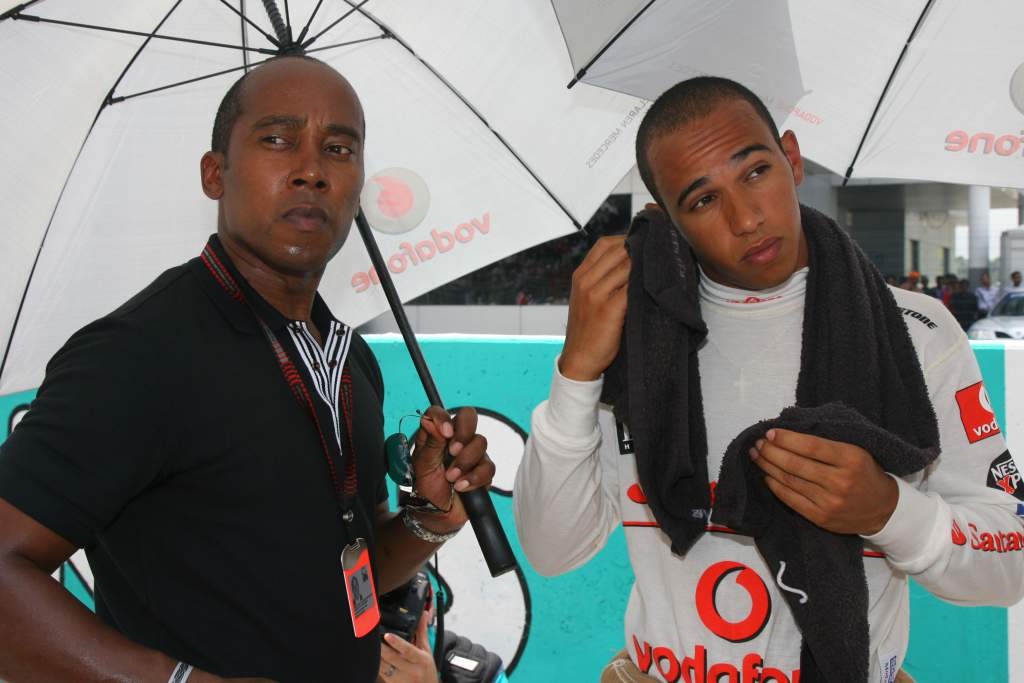 Lewis Hamilton with his father.