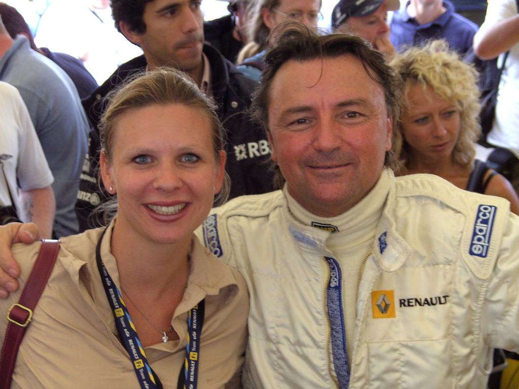 René Arnoux with a blonde female fan at Goodwood in 2006.