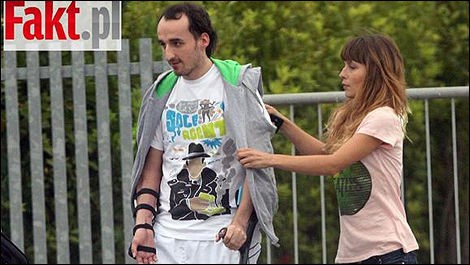 Robert Kubica after the accident with a girl.