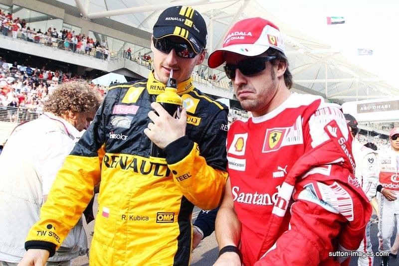 Robert Kubica with Fernando Alonso.