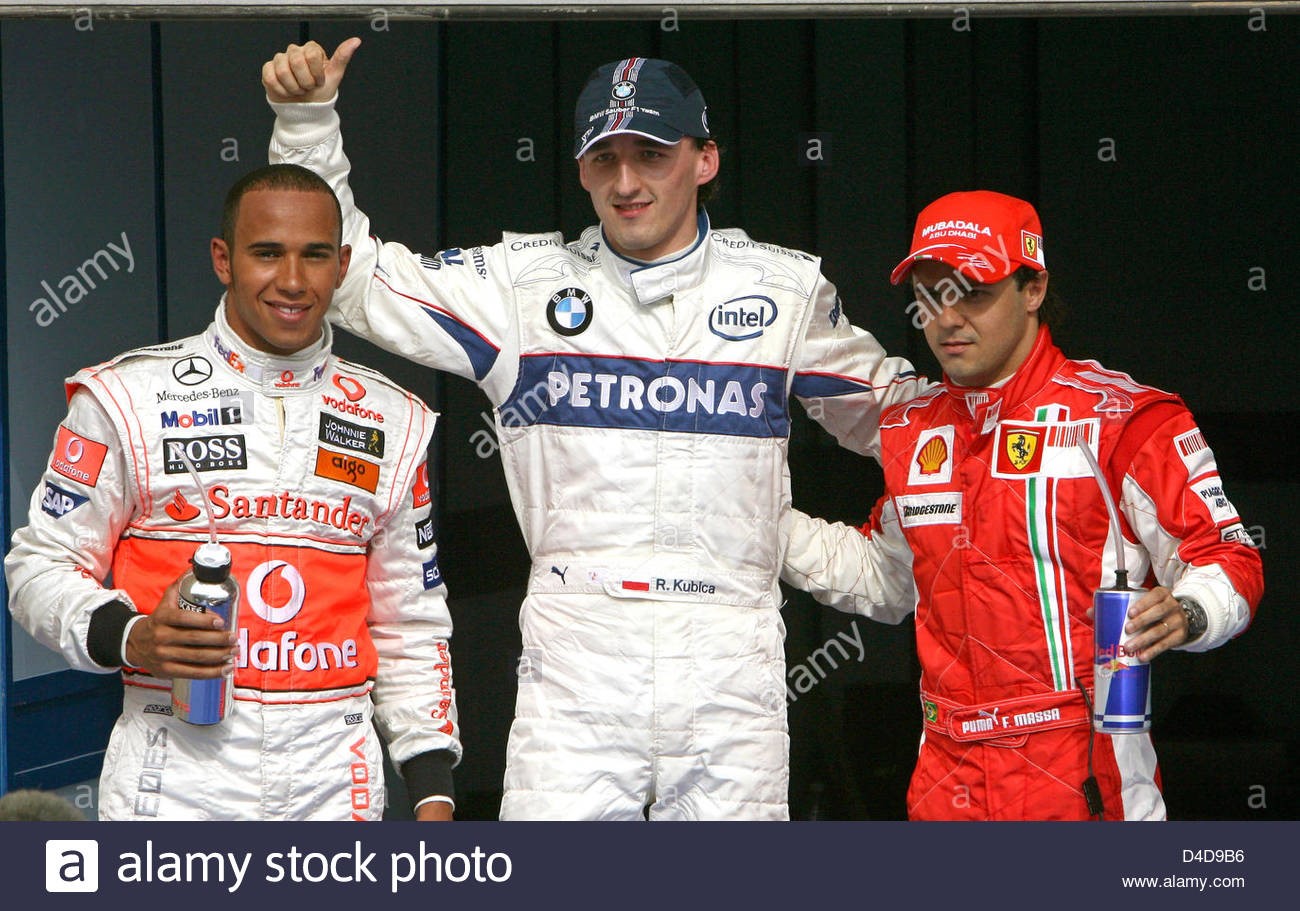 Robert Kubica of BMW Sauber, Lewis Hamilton of McLaren Mercedes and Felipe Massa of Ferrari celebrate after the qualifying session at Sakhir Circuit near Manama, Bahrain, 05 April 2008.