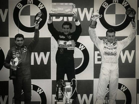 The podium of the Estoril GP. From left, Michele Alboreto, Ayrton Senna and Patrick Tambay.