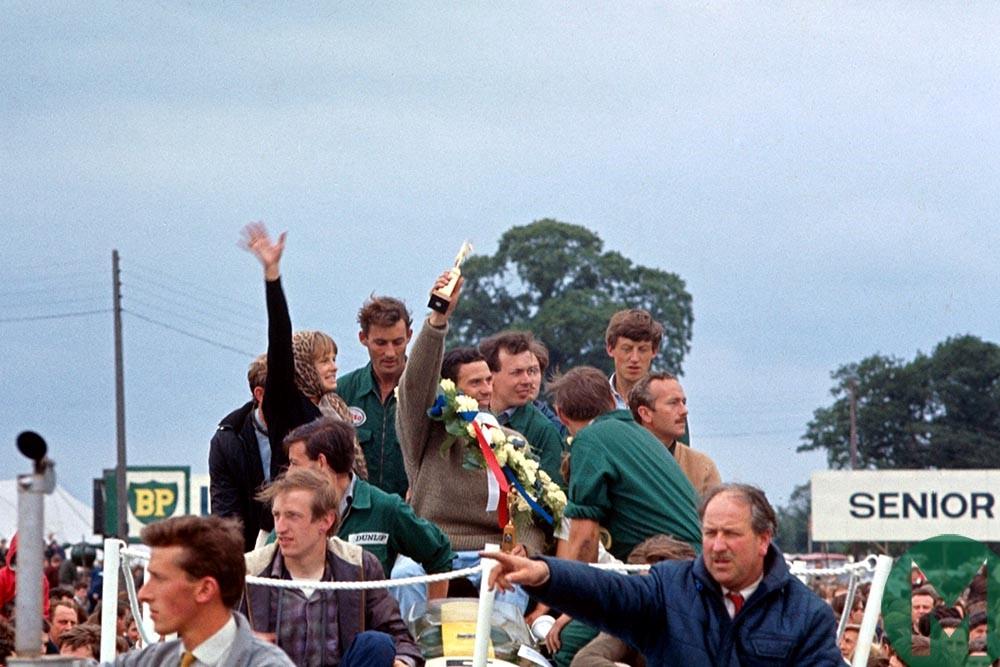 Clark and Sally on the podium after he won the 1963 British GP.