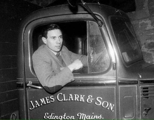 Jim Clark driving a truck.