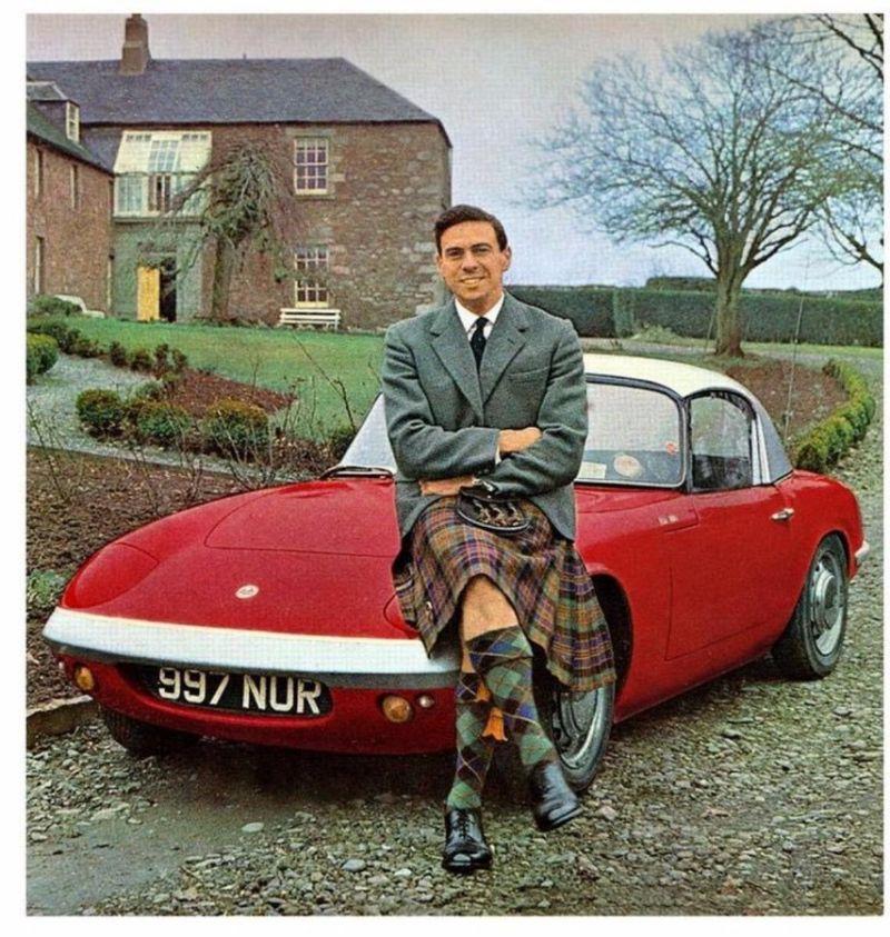 Jim Clark on a red spider car.