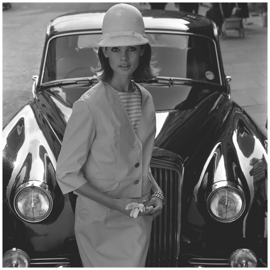 Jean Shrimpton in front of a Rolls Royce.