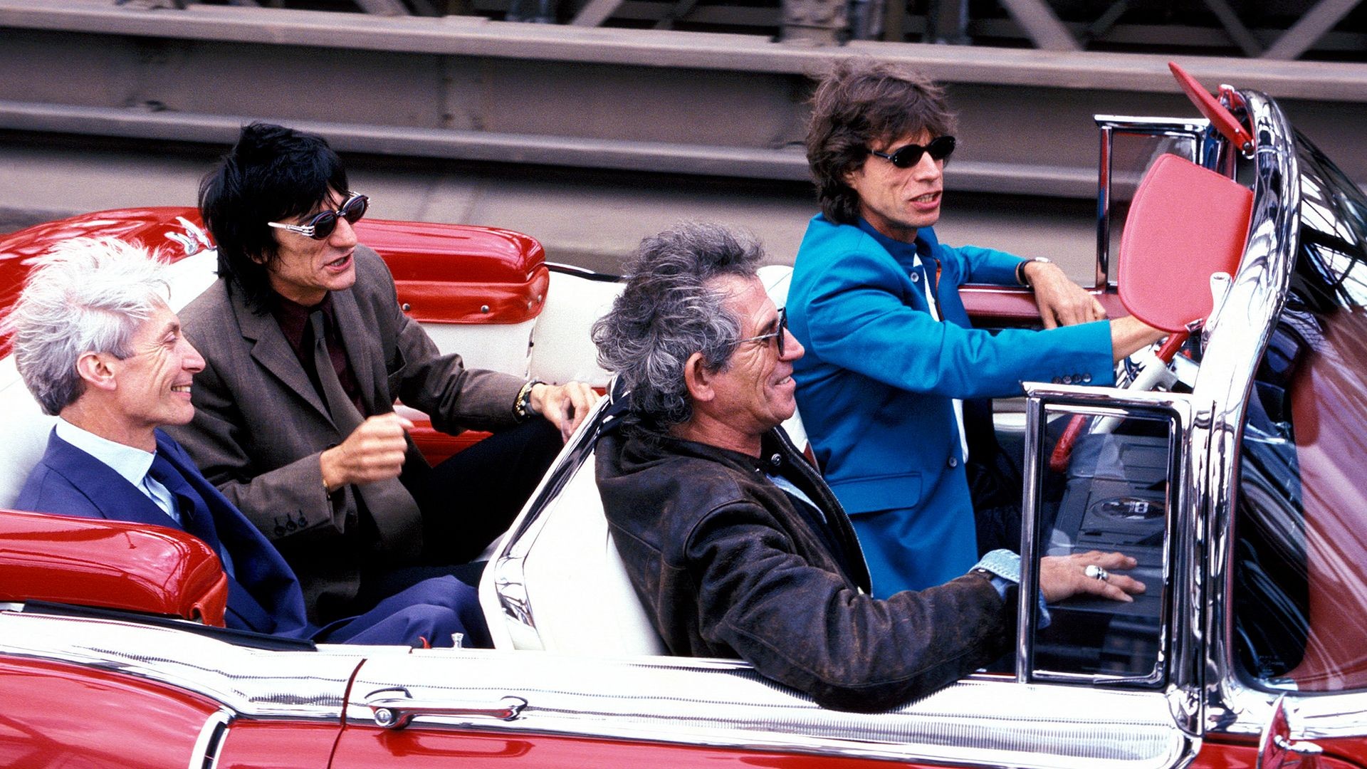 The Rolling Stones in a car. 