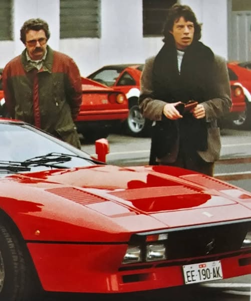 Mick Jagger picking up his Ferrari 288 GTO at Ferrari in Maranello back in 1985.