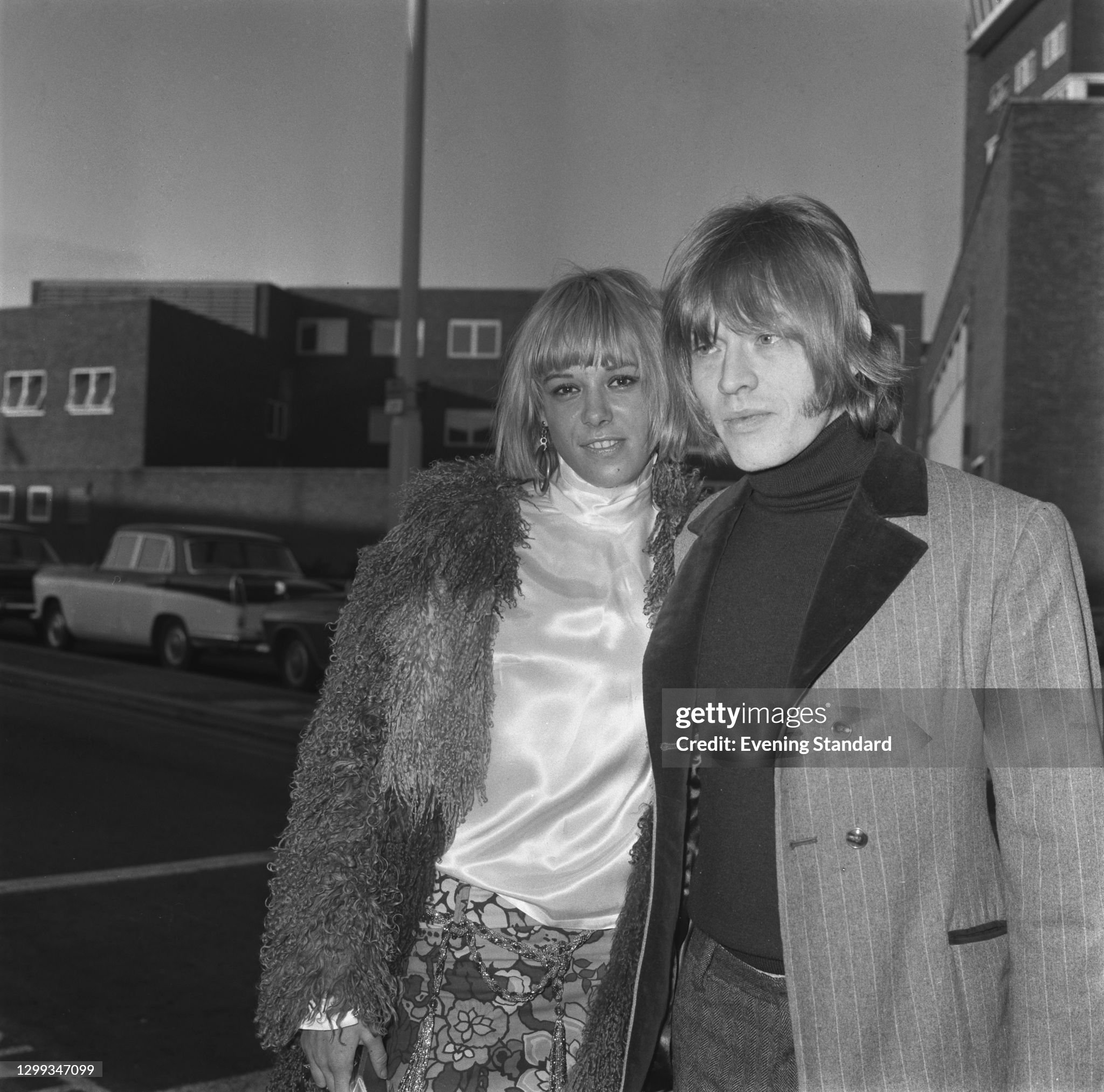 Musician Brian Jones (1942 - 1969) of the Rolling Stones meets his girlfriend, actress Anita Pallenberg (1942 - 2017), at London Airport, UK, on 03 December 1966. 