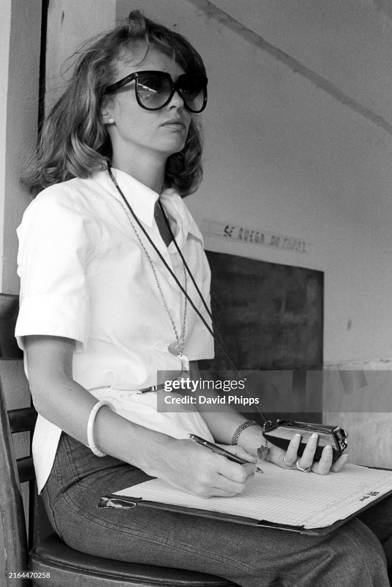 Barbro Peterson performs lap timing duties for her husband Ronnie Peterson, Tyrrell, at the Argentinean Grand Prix in Buenos Aires on 09 January 1977. 