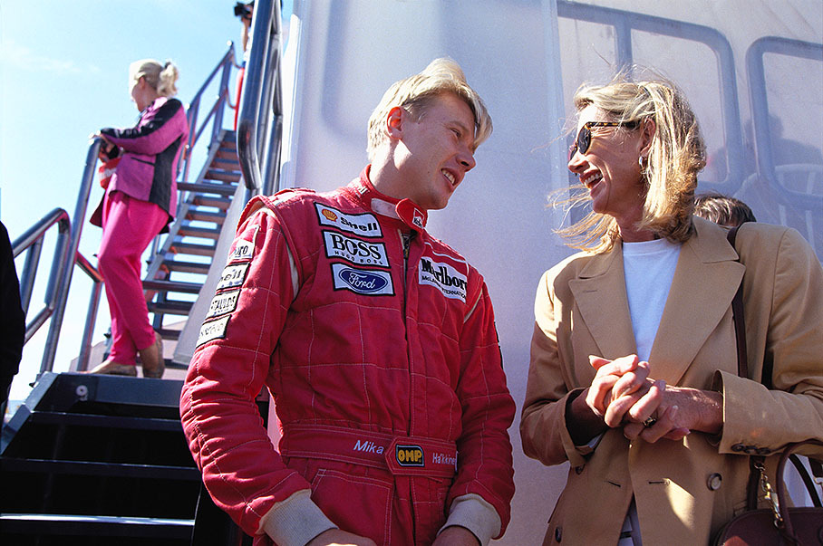 Mika Hakkinen chats with Nina Rindt at Estoril in1993.