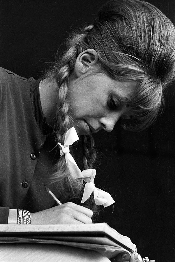 Sara Rodriguez keeps the times during the Italian Grand Prix in Monza in 1963. 