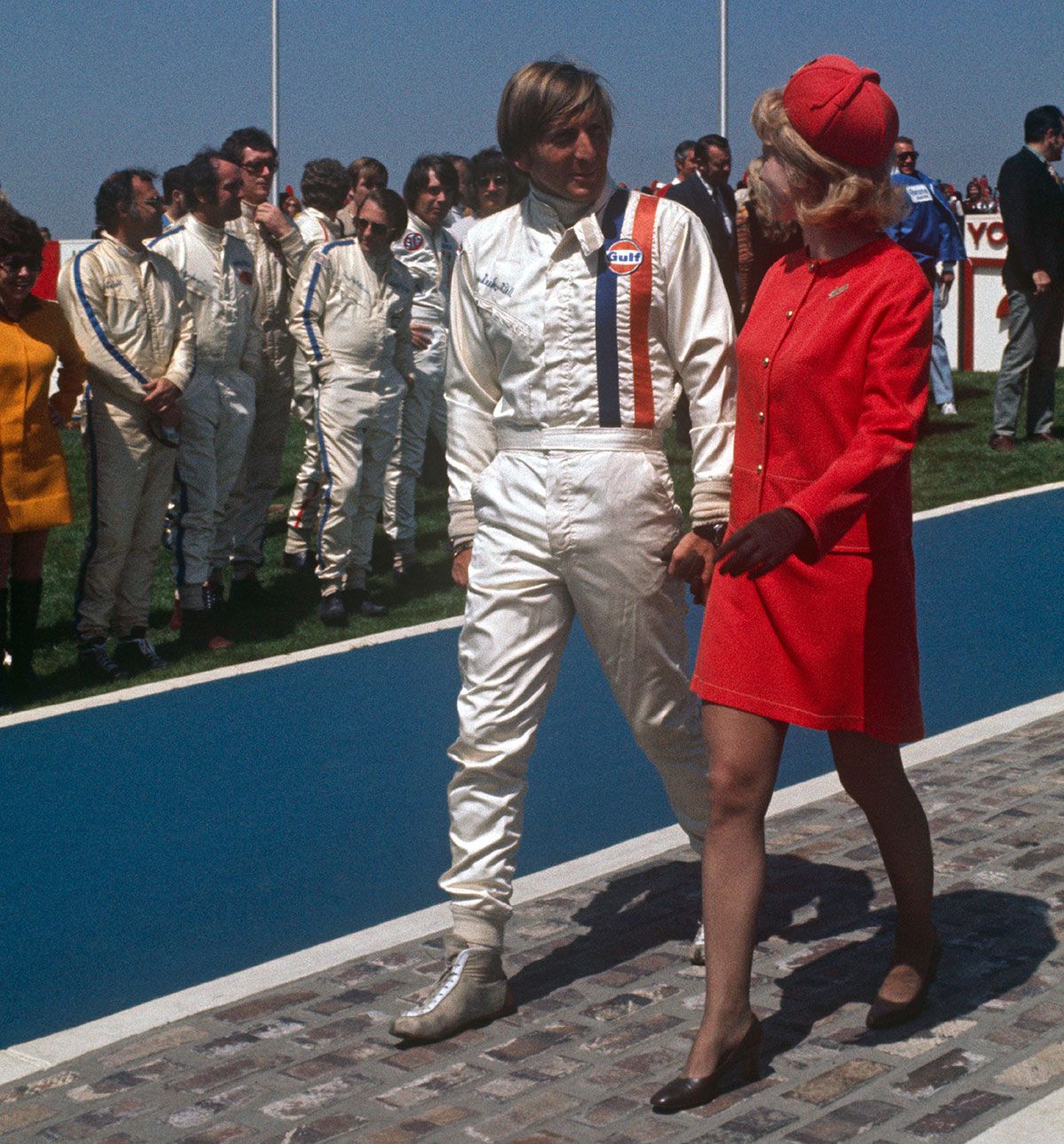 Derek Bell with a girl at the Questor Grand Prix in Ontario on 28 March 1971. 
