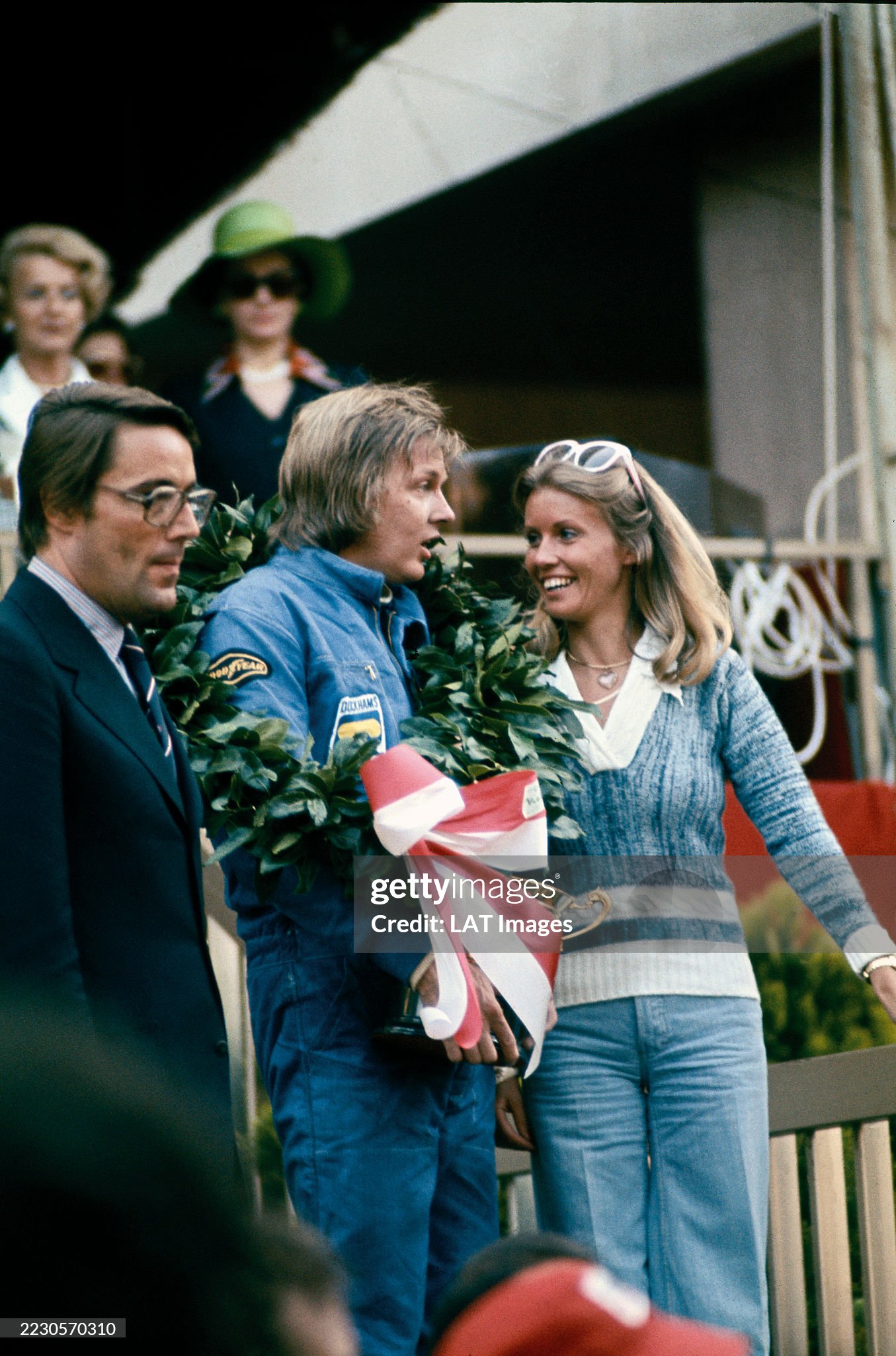 Ronnie Peterson and wife Barbro celebrate victory on the podium after the Monaco Grand Prix at Monte Carlo on May 26, 1974. 