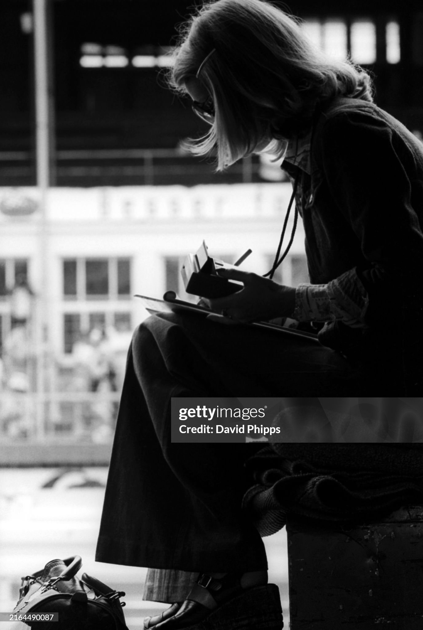 Barbro Peterson works the lap chart for her husband Ronnie Peterson, Lotus, at the German Grand Prix in Nurburgring on 04 August 1974. 