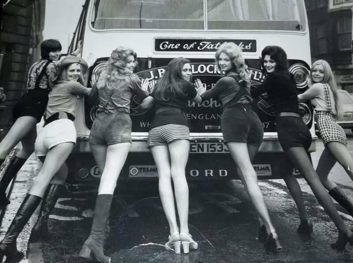 Vintage girls and a bus.