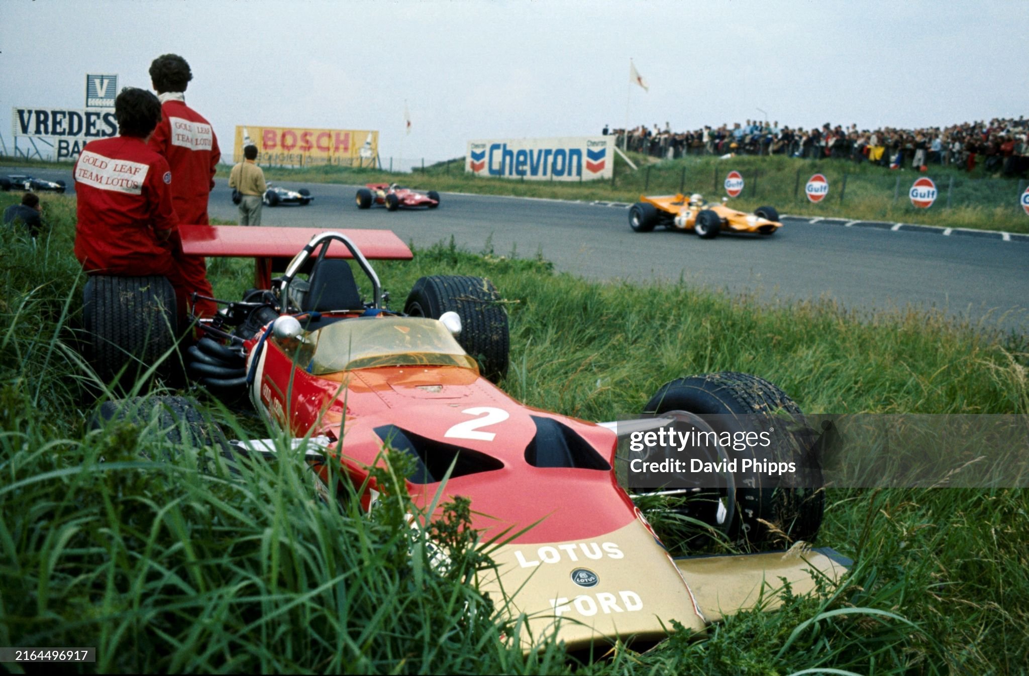 The Lotus Cosworth 49B of Jochen Rindt stands forlorn in the long Zandvoort grass after suffering driveshaft failure during the Dutch Grand Prix at Zandvoort on 21 June 1969. 