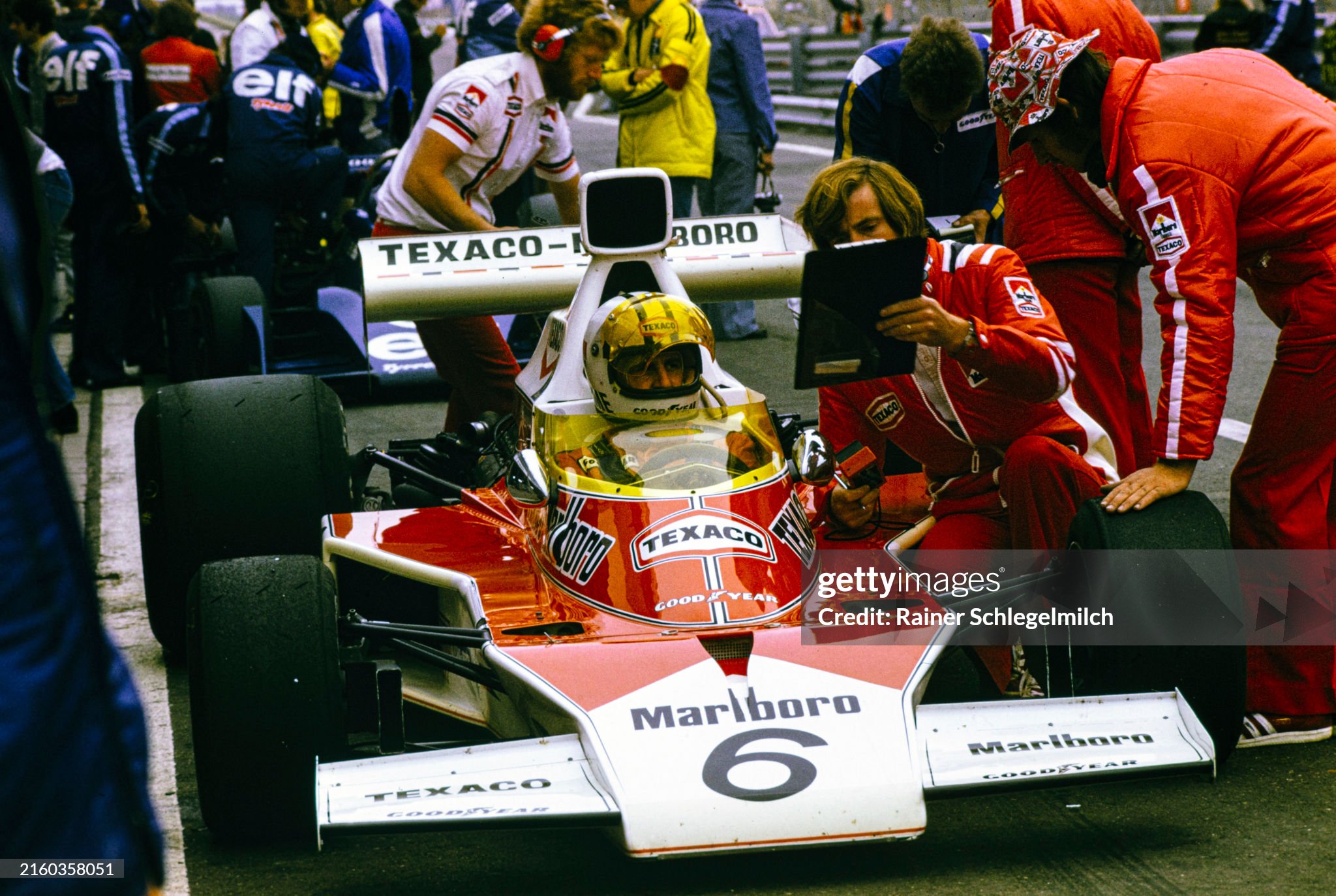 Denny Hulme, McLaren M23 Ford, in the pit lane during the Dutch Grand Prix in Zandvoort on 23 June 1974. 