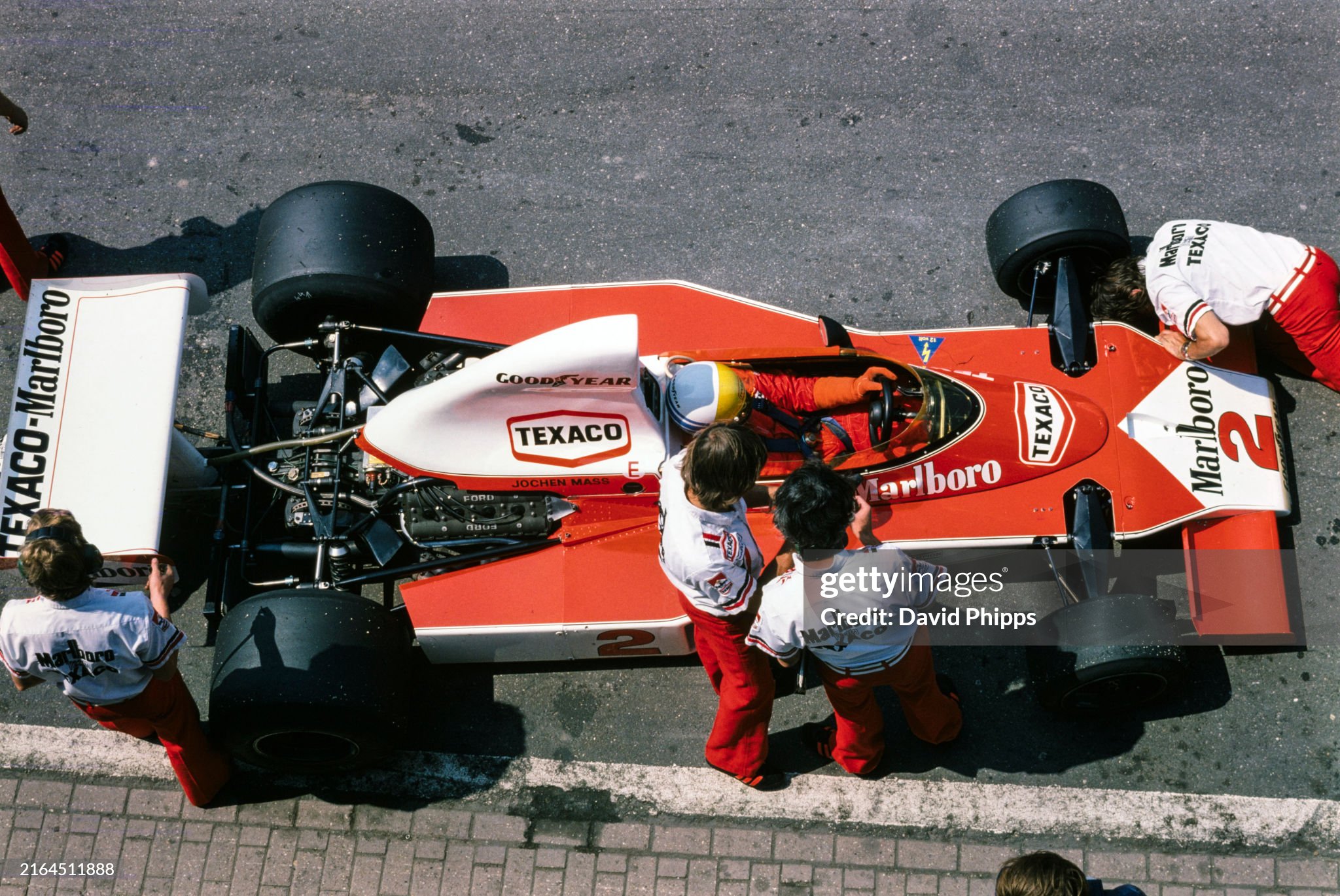 Jochen Mass, McLaren M23 Ford, in the pits during the Dutch Grand Prix in Zandvoort, Holland, on 22 June 1975. 