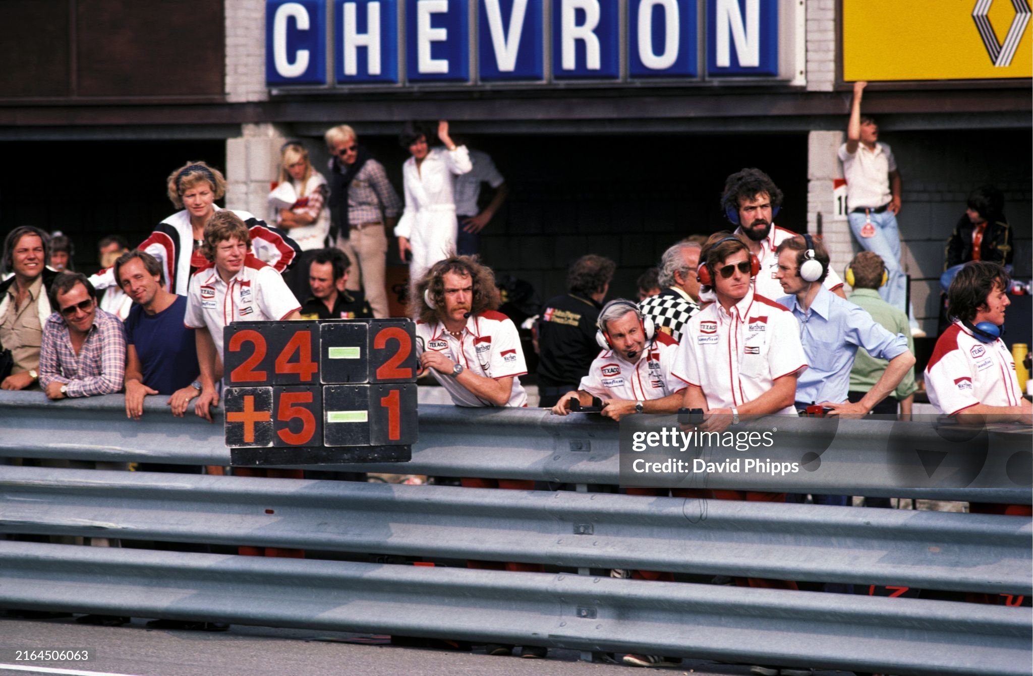 The McLaren team hold out a pit board for race winner James Hunt during the Dutch Grand Prix at Zandvoort on 29 August 1976. 